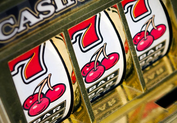 Close-up view of dice shaker and roulette wheel in Jewels of Prosperity studio at pt89
